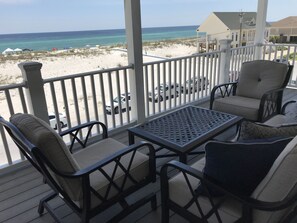 Enjoy the spectacular Gulf view from our shaded deck