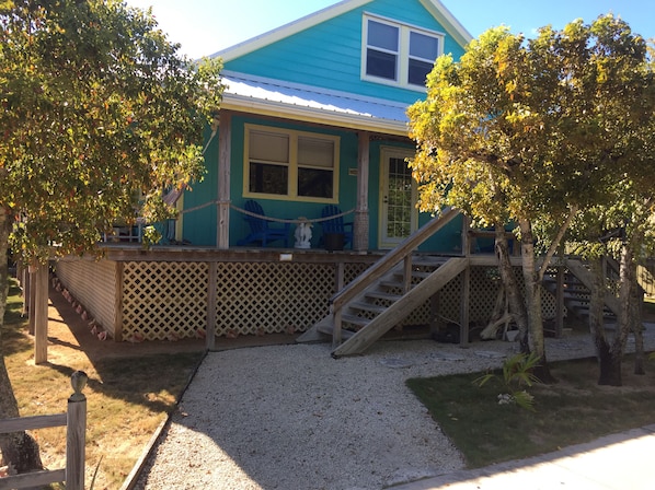 Blue Sargasso with wrap around porch and generous shade trees.