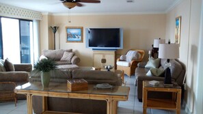 Can't you see yourself relaxing here! Large, comfy furniture. See the beach!