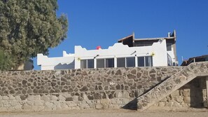 The View of the Beach Home Patio from the water  