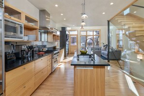 Stunning hardwood floors and modern cabinetry