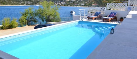 private pool in front of the house, 10 meters from sea