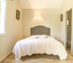 Bedroom with a double bed and an en-suite bathroom