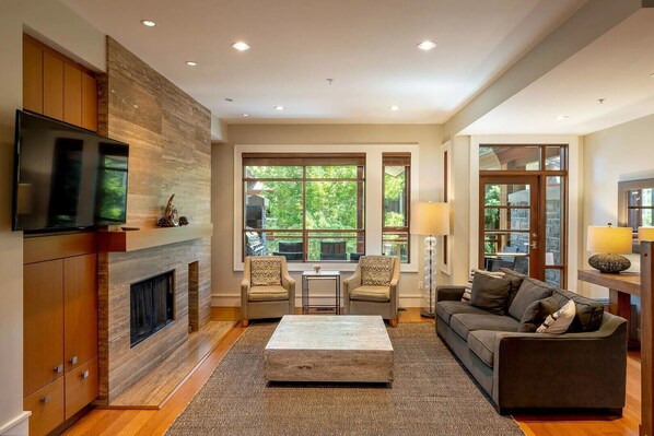 Living area: TV, wood burning fireplace, private patio