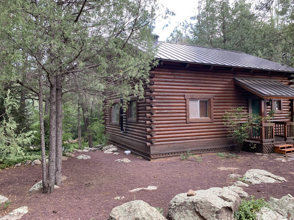 Cozy stream-front cabin nestled in the pines