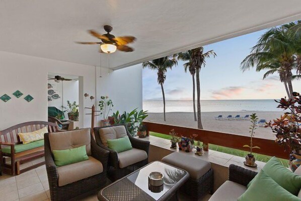 A terrace stretches the length of the condo and has direct access to the beach