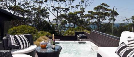 Sit in the spa sipping champayne after a hard day at the beach or after golf