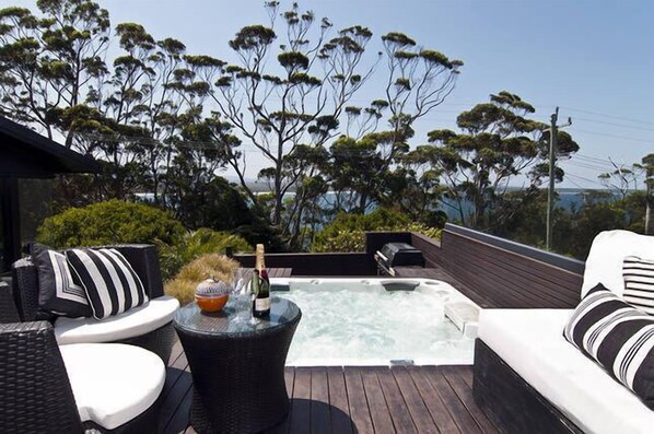 Sit in the spa sipping champayne after a hard day at the beach or after golf