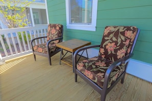 Enjoy your morning coffee or happy hour beverages on our front porch.