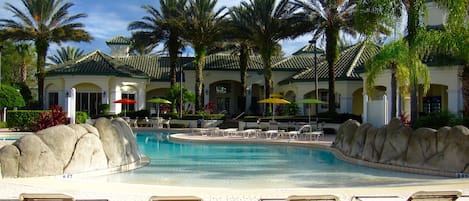 Relax by the pool! Just steps away from our condo!