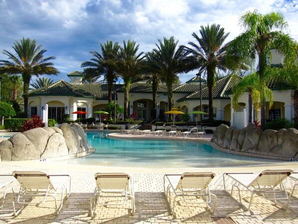 Relax by the pool! Just steps away from our condo!