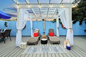 Experience the ultimate in outdoor living in our spacious backyard, perfect for gatherings or quiet reflection.