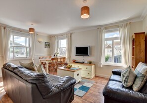 The apartment has a lovely feel to it, with comfortable leather sofas to relax in after a day of exploring 