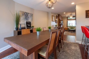 Huge Dining room table. Shot looking into the Living Room