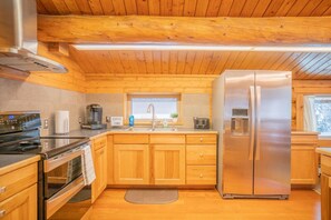 Full Kitchen with Stove, Oven, and Refrigerator