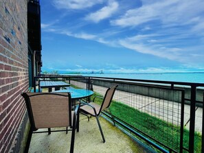 Cozy Waterfront Retreat
This intimate patio is the perfect place to relax and take in stunning lake views. Whether you're dining al fresco or just soaking in the scenery, it's a peaceful escape.

