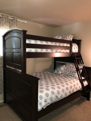 Upstairs bedroom 
Queen/ twin bunk bed
