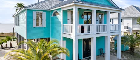 Sandhill Beachhouse sits on it's own private beach, right on the Gulf of Mexico