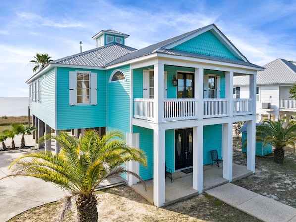 Sandhill Beachhouse sits on it's own private beach, right on the Gulf of Mexico