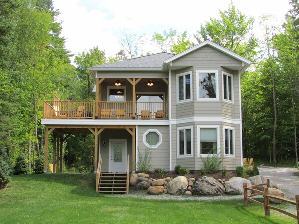 Upper deck hot tub with outstanding views of Whiteface and surrounding ranges.