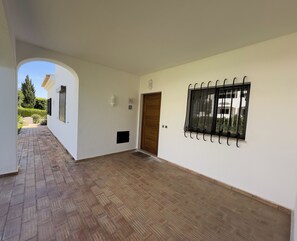 Front entrance of apartment in block 34, which is away from perimeter roads