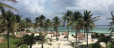 View of the beach and the Caribbean from the patio deck of VDM C 205