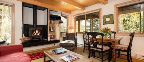 Open Living Space w/ TV and Wood Stove