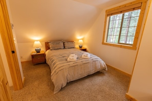 One of the upstairs bedrooms.  Beds are super comfortable!