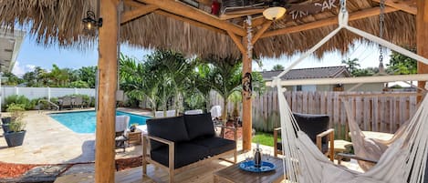 Beach House Retreat with Heated Pool, Tiki and Large Travertine Patio!