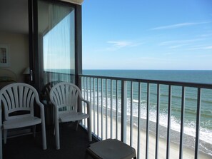 9th floor Ocean front condo #920 balcony with 4 chairs and small table