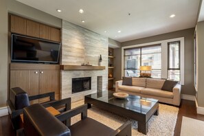 Living area: TV, wood burning fireplace, access to patio