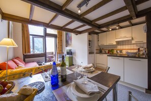 Charming open plan duplex with balcony