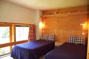 Master bedroom with two single beds
