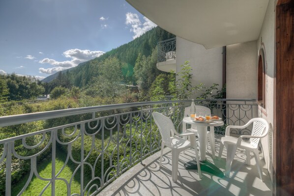 Private sunny balcony with a superb mountain view
