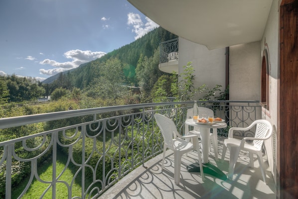 Private sunny balcony with a superb mountain view