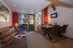 Open plan living space with a private balcony