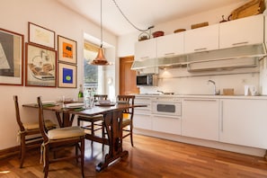 Well equipped kitchen with a dining area