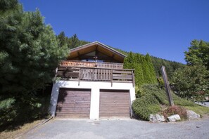 View of chalet and garage