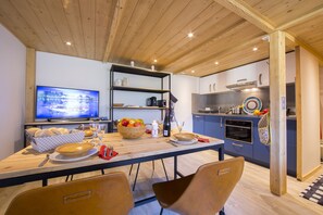 Kitchen and dining area with HDTV
