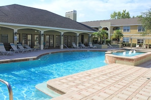Heated resort pool with clubhouse.