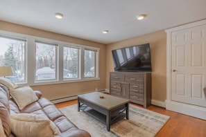 Living Room With Big Screen TV and Couch