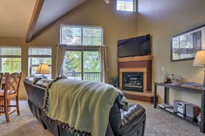 The home offers numerous amenities, like a gas fireplace & flat-screen cable TV.