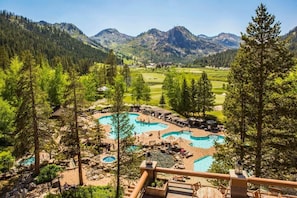 Multiple heated pools and hot tubs overlook 8-hole golf course & Palisades Mtns