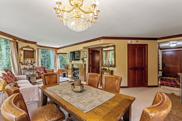 Largest two-bedroom with expansive living room, dining room & mountain run views