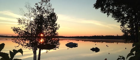 The view from our deck, sunrise on Round Lake