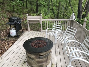 Upper patio fire pit and grilling area to enjoy dinner with a glass of wine.