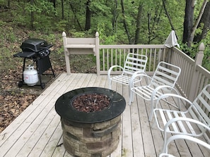 Upper patio fire pit and grilling area to enjoy dinner with a glass of wine.