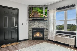 Living Room - with 55" Roku TV, gas fireplace, and beautiful views.