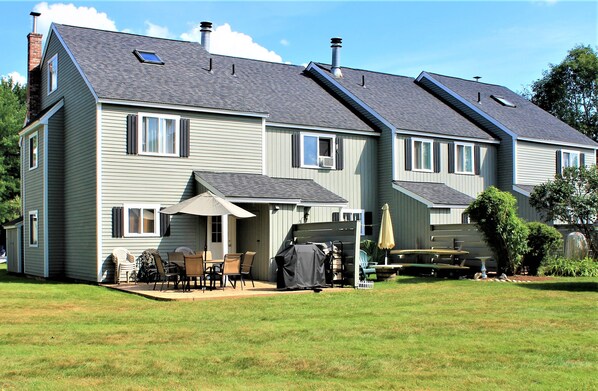 Stamped concrete patio  seats  12, Grill, lawn games provided.