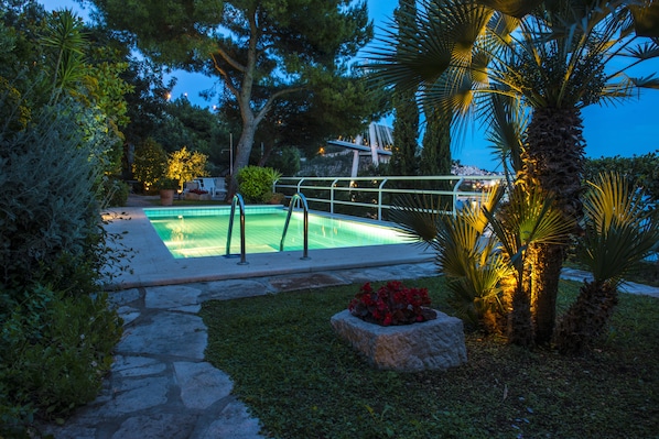 Our beautiful infinity edge pool at the sunset